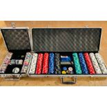 Two sets of Poker chips in metal cases