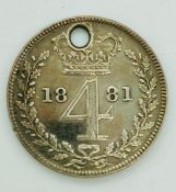 An 1881 Four pence coin