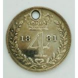 An 1881 Four pence coin