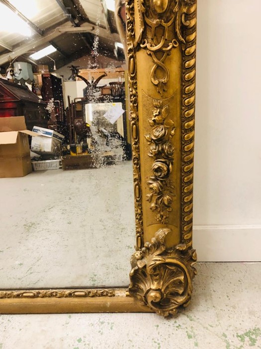 A Heavy gilt ornate mirror 140cm x 92cm (AF) - Image 2 of 2