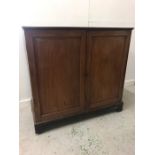 A Mahogany Linen cupboard with panelled door 119cm x 126cm x 60cm.