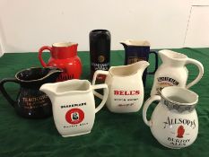 A selection of eight water jugs from various Brewery's and drink manufacturers including several