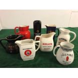 A selection of eight water jugs from various Brewery's and drink manufacturers including several