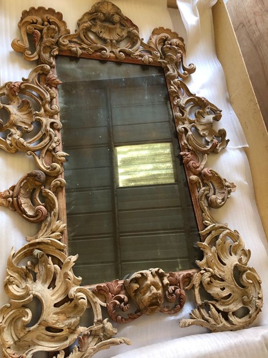 A Stripped Lime and Pine Mirror. A modern rectangular plate within an elaborate pierced foliate