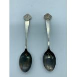 A pair of hallmarked silver teaspoons hallmarked year 2000.