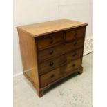 A Two over three pine chest of drawers