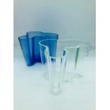 Pair of Alvar Arto Hankie vases, one blue and one clear both 12cms tall