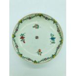 An 18th Century hand painted saucer