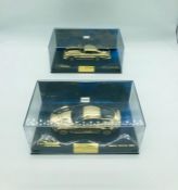 Two Minichamps Limited Edition Gold diecast Aston Martin DB5 1599/2016 and 0132/2016