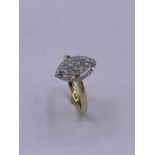 A 18ct yellow gold diamond lozenge shaped ring of 1/2ct approx.