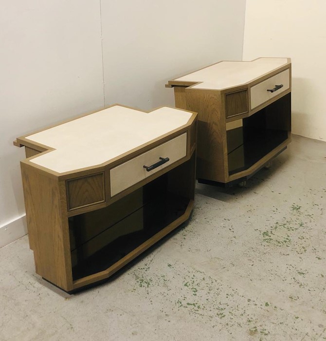 Two Bedside tables with leather tops metal handles and glass fronted cupboard.