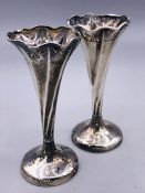 A Pair of silver vases, hallmarked Birmingham 1901 by Robert Pringle and Sons