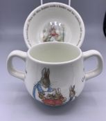 A Boxed Peter Rabbit gift set to include two handled mug and bowl