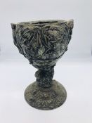 A metal chalice style vessel