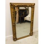 A Heavy gilt ornate mirror 140cm x 92cm (AF)
