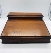 A small portable writing box or slope with inkwell