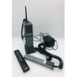 A Nokia CITYMAN 1320 Mobile Phone with relevant chargers batteries etc.