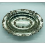 A silver floral decorated bowl Hallmarked Birmingham 1911 335g.