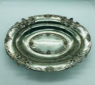 A silver floral decorated bowl Hallmarked Birmingham 1911 335g.