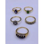 Five rings in various setting all hallmarked 375.