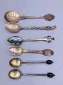 A small selection of silver spoons.