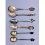 A small selection of silver spoons.