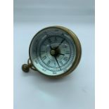 A Desk ball clock and compass