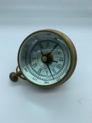 A Desk ball clock and compass