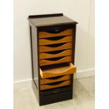 A lockable music or medal cabinet