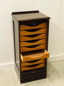 A lockable music or medal cabinet