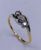 An 18ct yellow gold three stone diamond ring of 1/2ct approx.