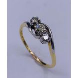 An 18ct yellow gold three stone diamond ring of 1/2ct approx.