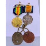 The British War Medal and The Victory Medal, along with Dog Tags for 160253 GNR A H JAY R.A