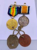 The British War Medal and The Victory Medal, along with Dog Tags for 160253 GNR A H JAY R.A