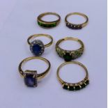 A selection of six 9ct gold rings with various settings