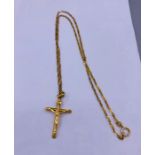 A 9ct gold crucifix on chain (3.1g)