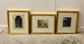 Three framed prints in gold frames to include Bruges Cathedral, Ladies by a lake and a landscape.