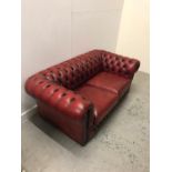 Two Seater Ox Blood Chesterfield style sofa