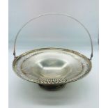 A Silver cake stand with handle, with a pierced design, marked 925 360g