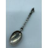 A single silver Apostle spoon.