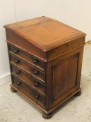 A Davenport desk with leather top.