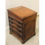 A Davenport desk with leather top.