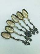 Six decorative teaspoons stamped `TH. Marthinsen, Sterling, Norway`