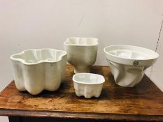 A selection of Four Vintage Ceramic Jelly Moulds