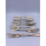A set of nine Sterling Reed and Barton forks (420g)