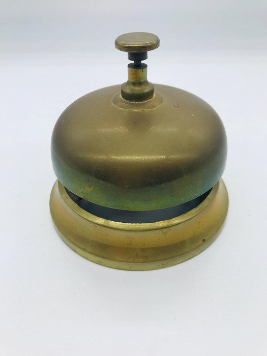 A Brass shop counter bell.