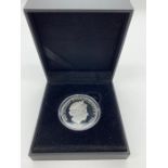 A silver proof 2015 Five Pound coin