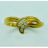 An 18ct gold ring with diamonds (3.1g)