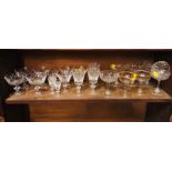 Selection of cut glass champagne coupes and sherry glasses