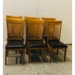 Set of Six Beech Dining Chairs with Brown Faux Leather Seats